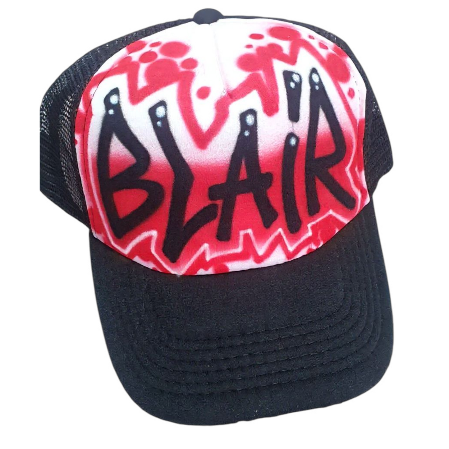 Black trucker cap with red and white design and 'BLAIR' airbrushed text on a white background