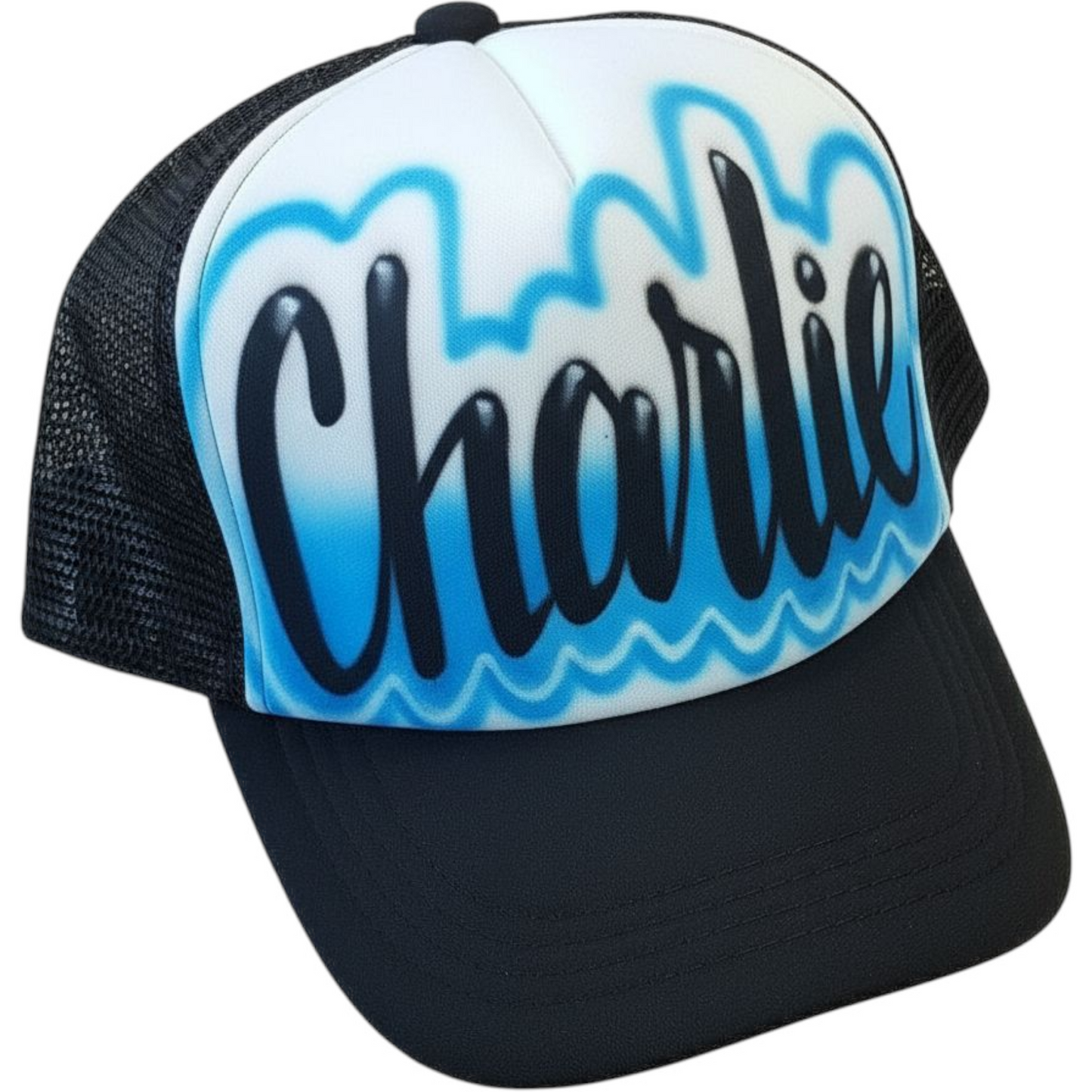 Black trucker cap with 'Charlie' airbrushed in a script font with a blue design on a white background