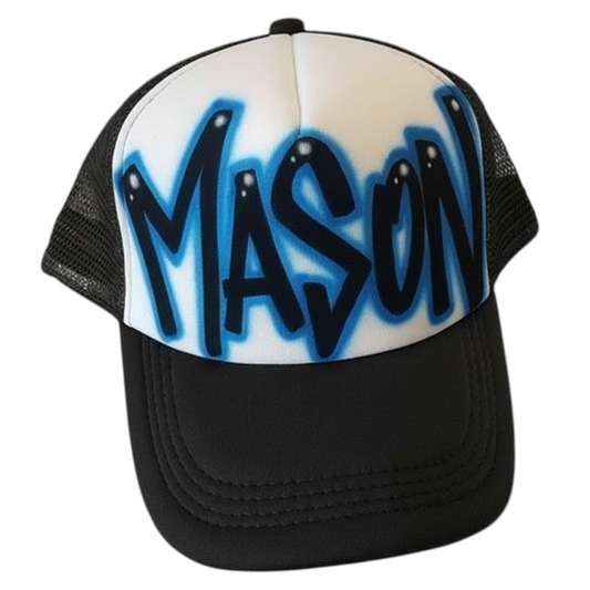 Black and white cap with 'MASON' in blue and black graffiti-style airbrush text on a white background