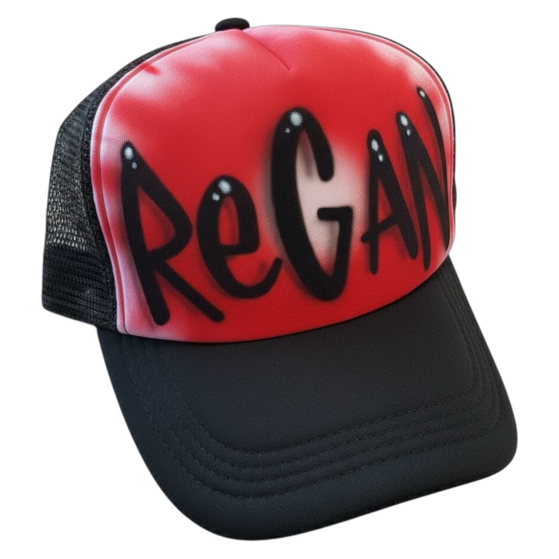 Black trucker cap with 'Reagan' airbrushed with a red design on a white background