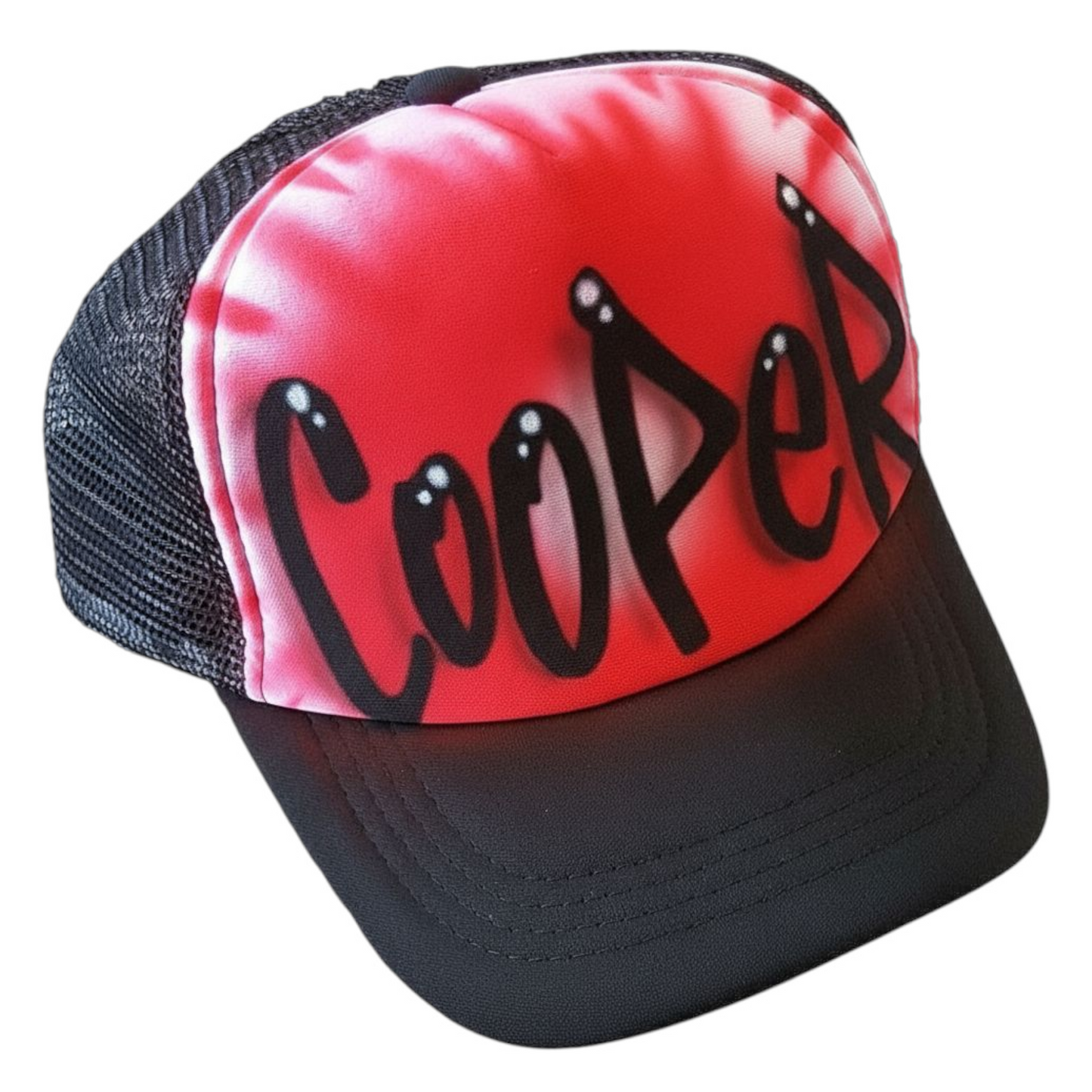Black trucker cap with 'Cooper' airbrush urban text with a red design on a white background